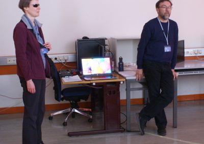 Workshop 2 von Mag. Hattinger und Mag. Guano. Es sind beide Referenten abgebildet, wie sie vor den Teilnehmer*innen stehen.